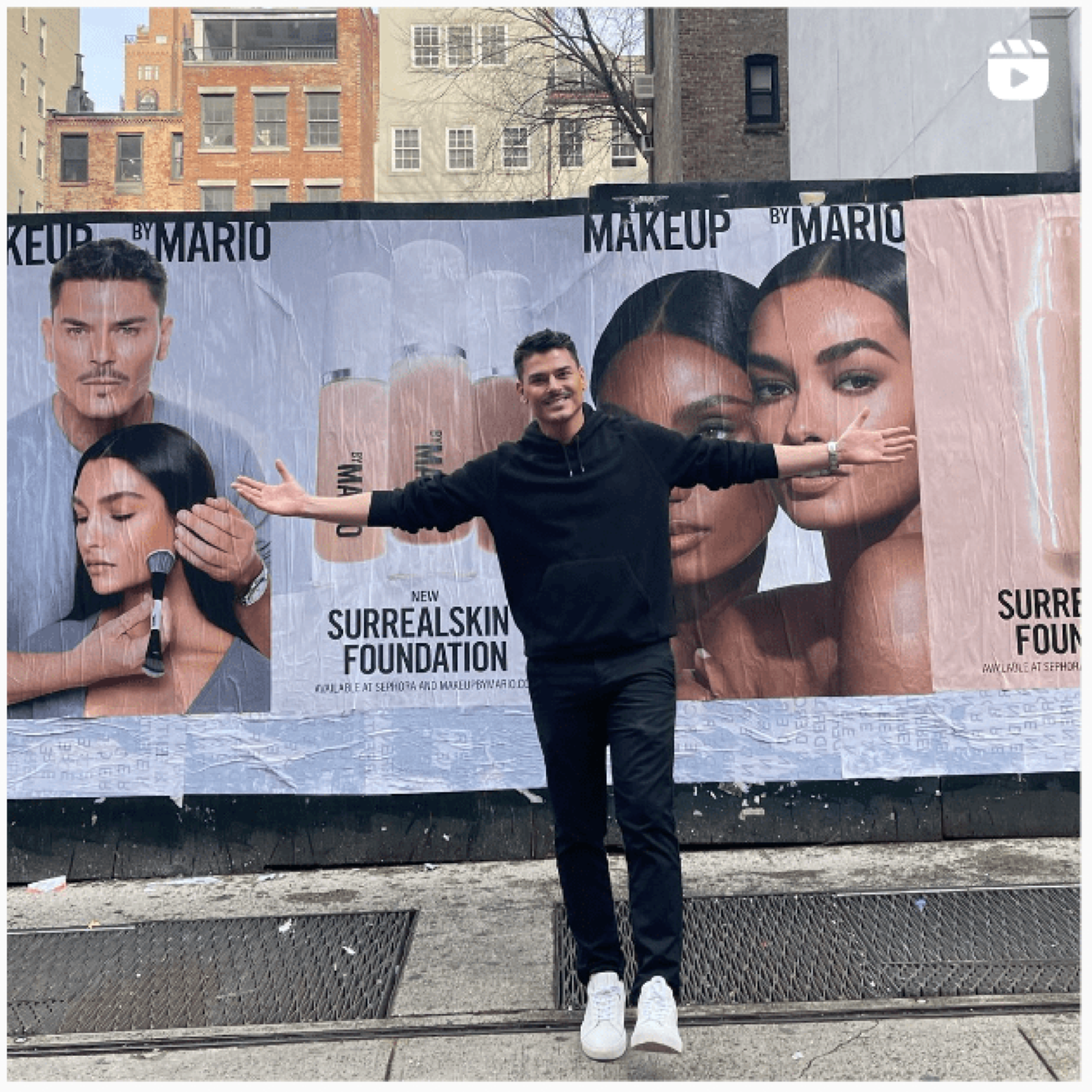 Mario in front of the SurrealSkin launch billboards