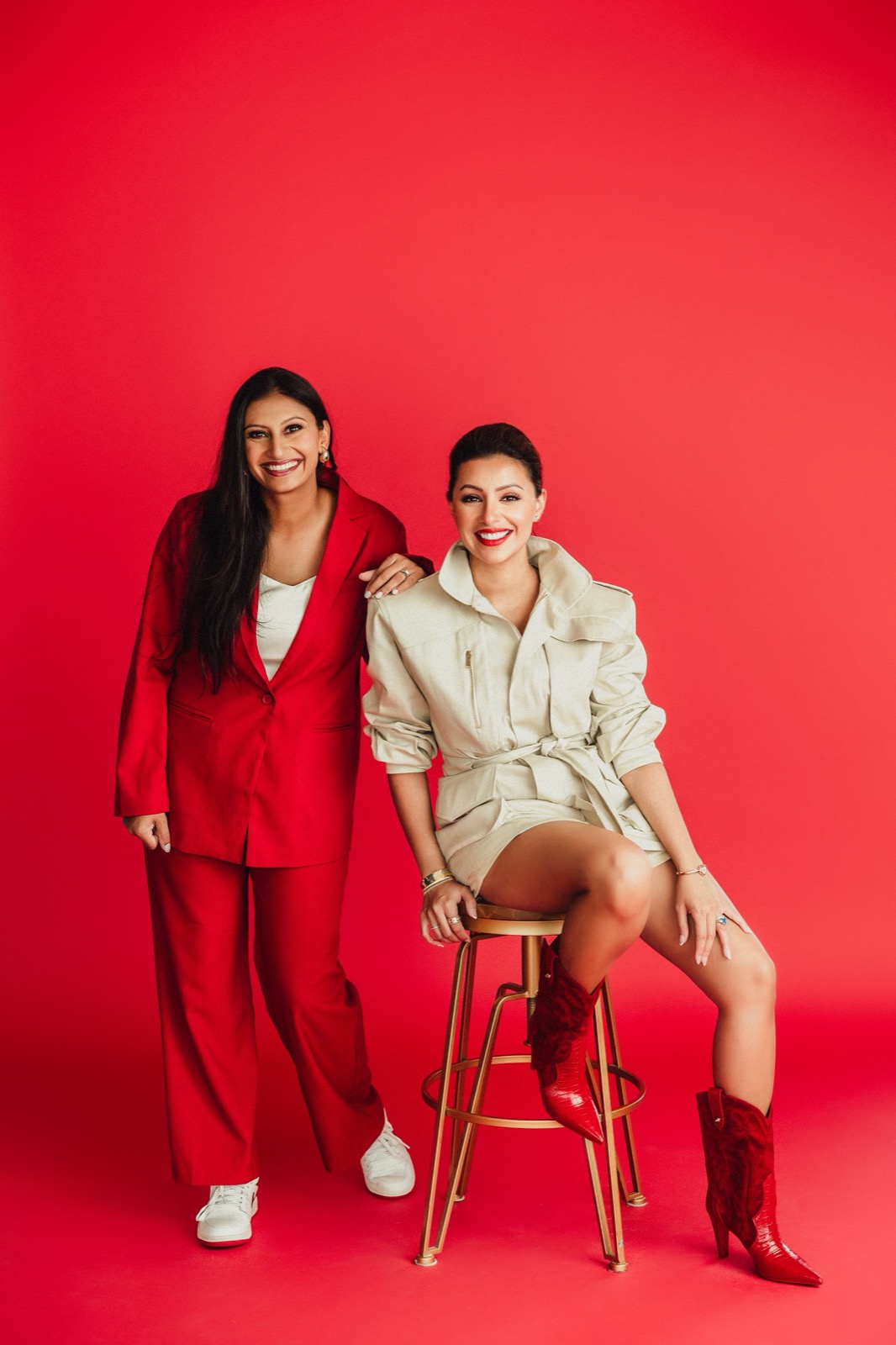 Prereq founders in red against a red backdrop